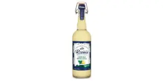 Lemon mint beverage in glass bottle