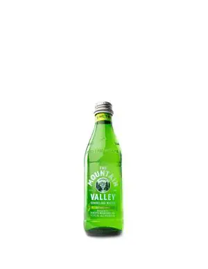 Green bottle of Mountain Valley sparkling water.