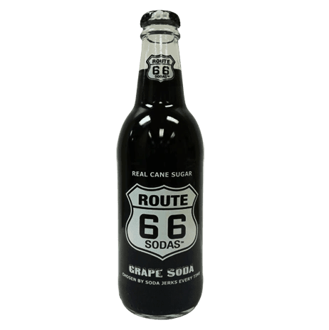 Dark grape soda in glass bottle