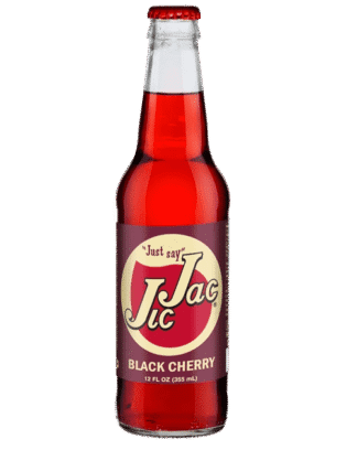 A glass bottle of JJ Jac Black Cherry soda with red liquid inside.