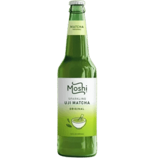 Green matcha drink bottle on black background.