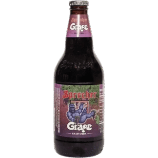 Dark beverage in a glass bottle