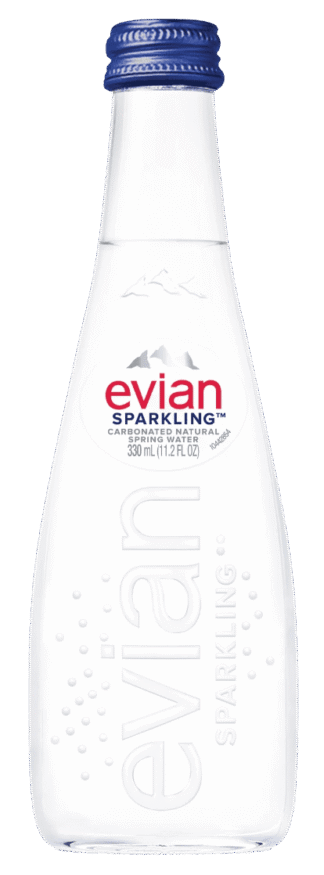 Evian sparkling water bottle on black background