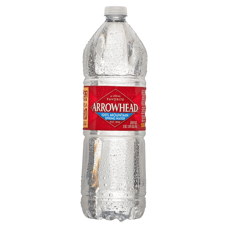 Arrowhead spring water bottle against black background