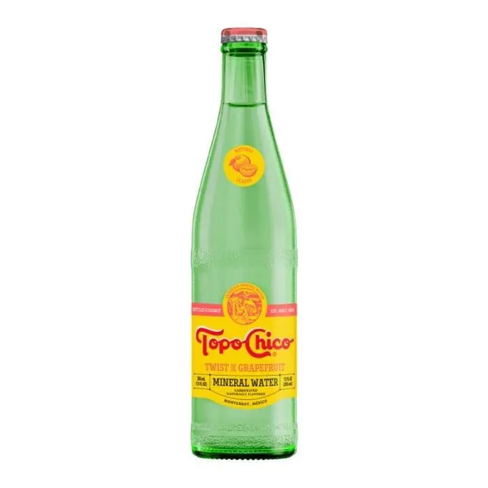 Sparkling water bottle on white background