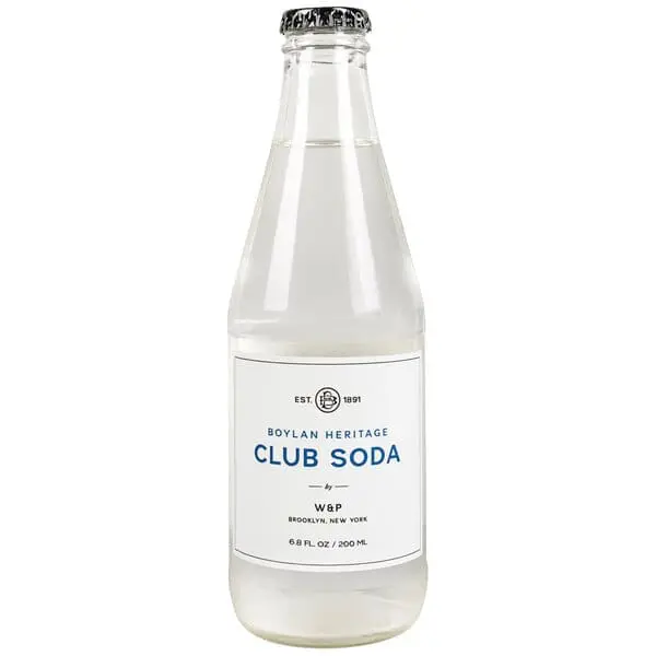 Clear glass bottle of club soda