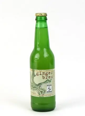 Green glass bottle labeled ginger brew