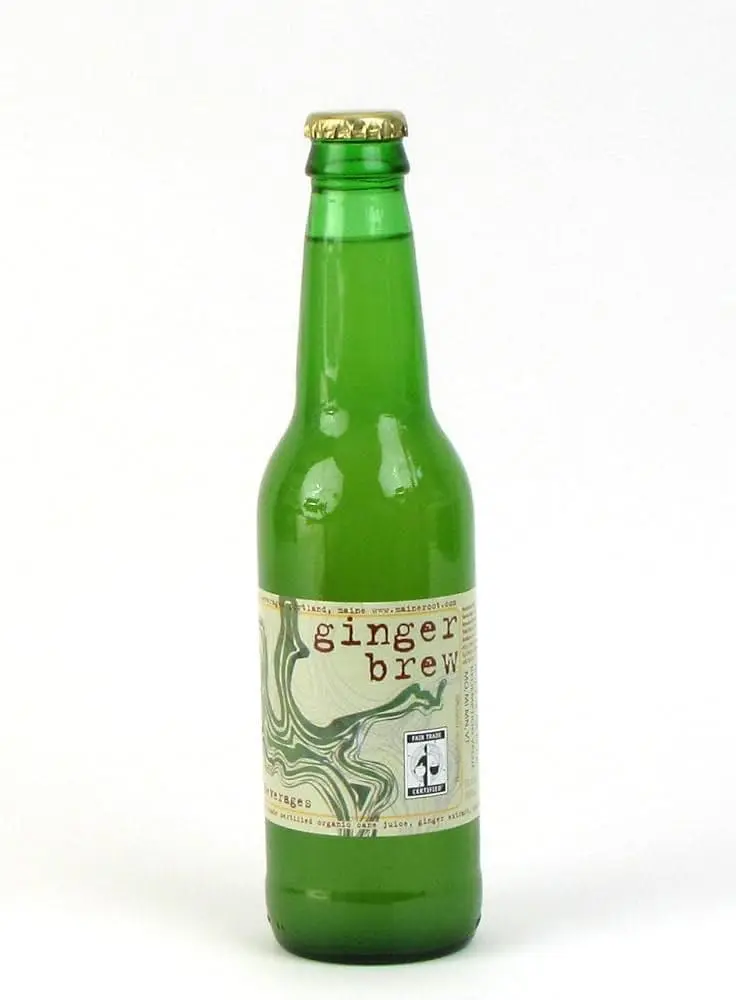 Green glass bottle labeled ginger brew