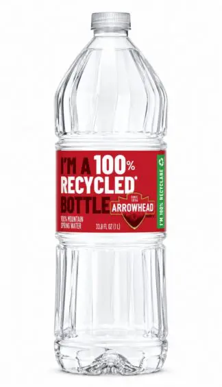 Clear recycled plastic water bottle with red label