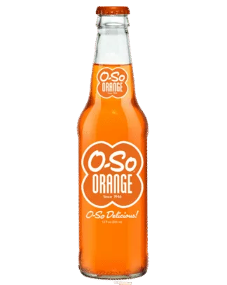 Orange soda bottle against black background