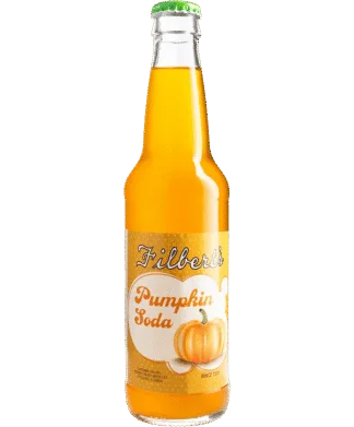 A bottle of pumpkin soda with an orange drink inside.