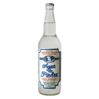 Clear glass bottle of mineral water